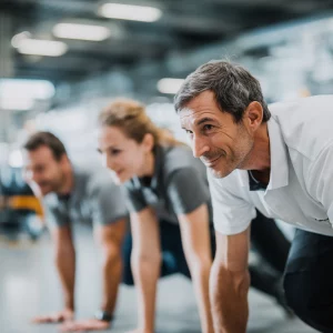 Praticienne PoB guidant un petit groupe de salariés dans un exercice de respiration lors d’un Safety Day.